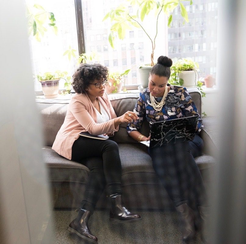 black women huddled